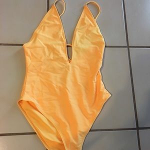 Yellow one piece bathing suit